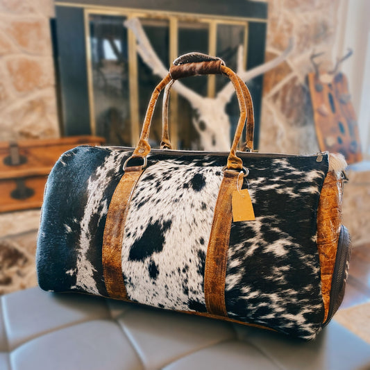 Black and White Spotted Cowhide Genuine Distressed Leather Barrel Duffel Bag - Sobék