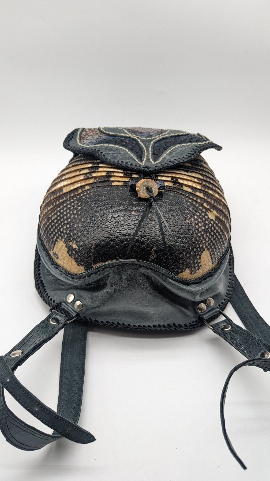 Bohemian Armadillo Snakeskin Whipstitch Leather Backpack with Antler Bone Closure, Bohemian Bag with Armadillo Shell and Fringe Charm - Sobék
